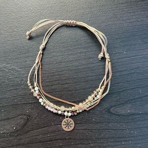 Like New Pink Four Bracelet Set Complete With a Snowflake-Like Charm and Gems
